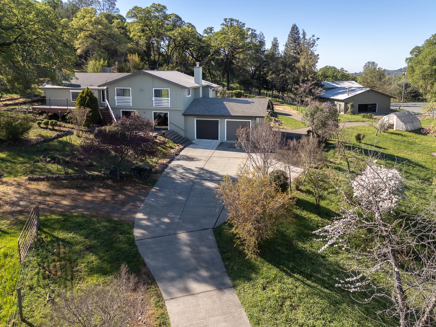 22801 Hidden Ranch Road Auburn, CA 95602 - Photo 1 of 94 a view of a house with a yard and sitting area