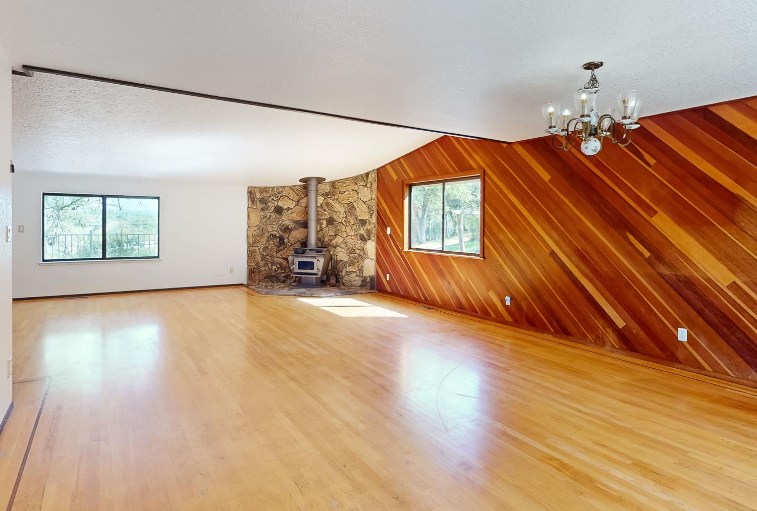 22801 Hidden Ranch Road Auburn, CA 95602 - Photo 18 of 94 wooden floor in an empty room with a window