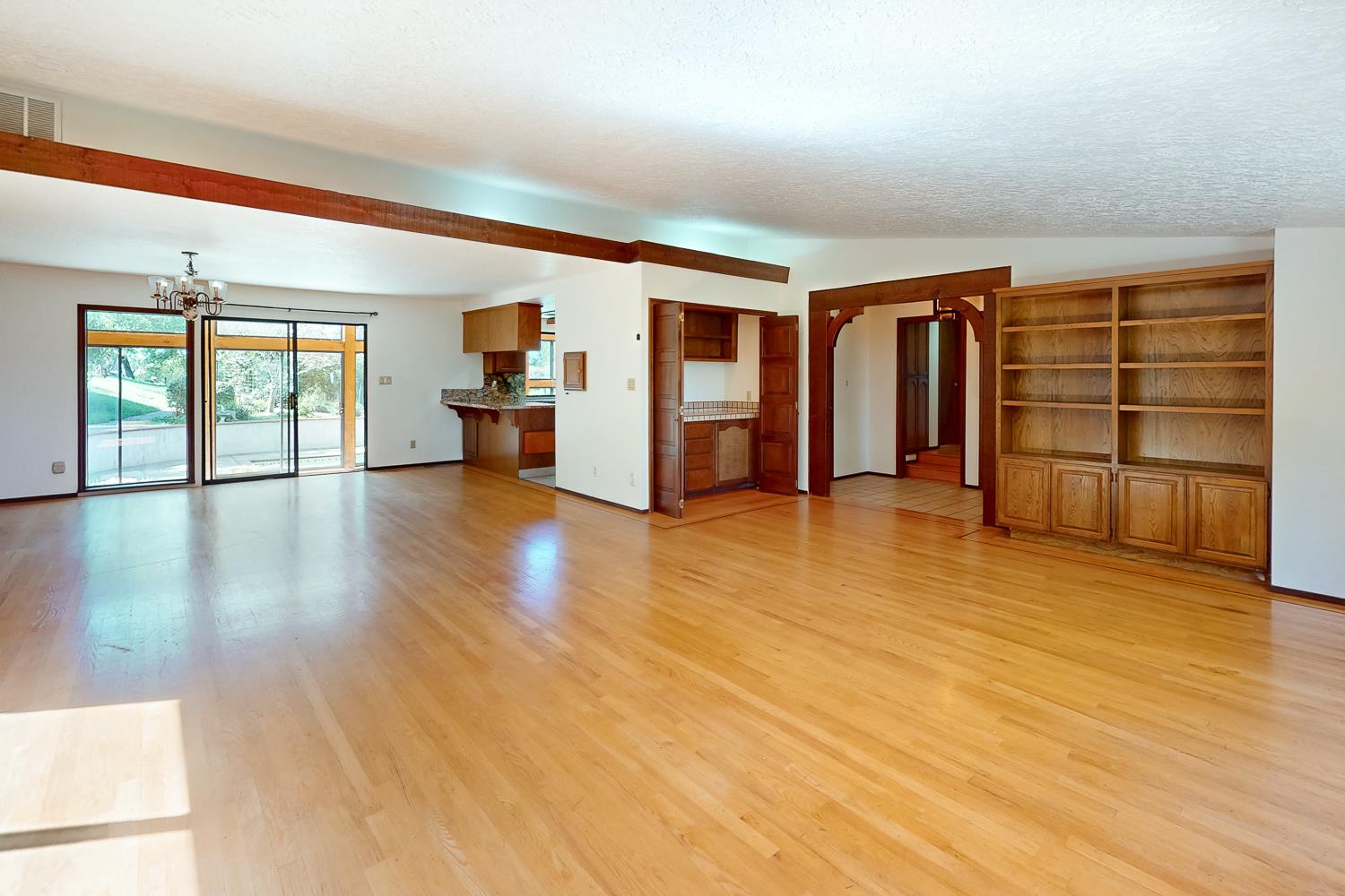 22801 Hidden Ranch Road Auburn, CA 95602 - Photo 7 of 94 wooden floor in an empty room with a window