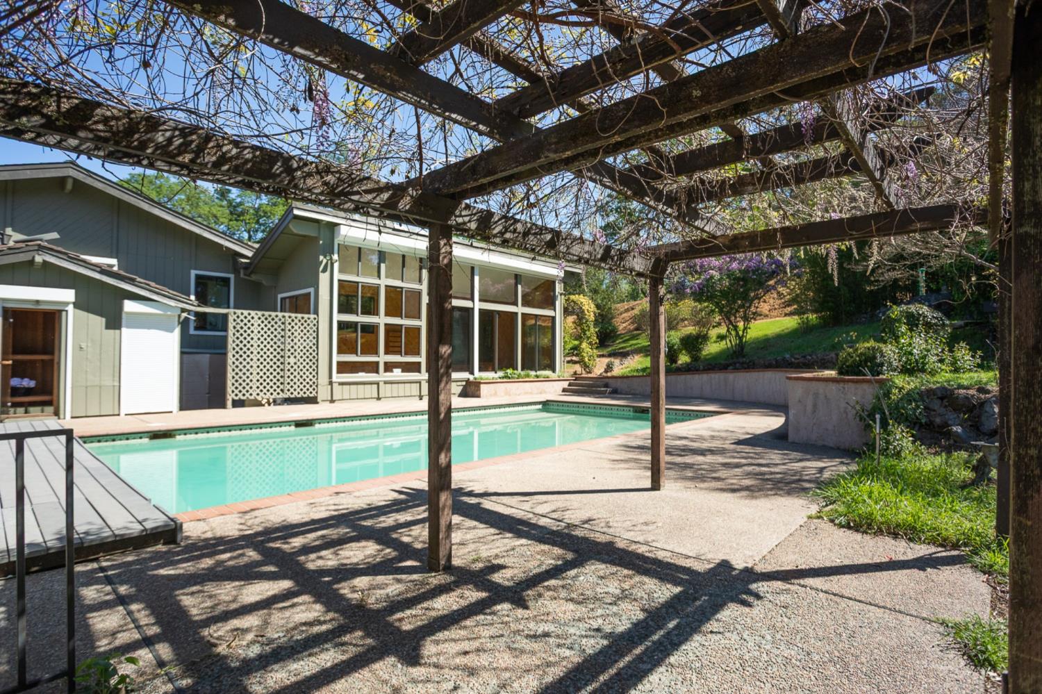 22801 Hidden Ranch Road Auburn, CA 95602 - Photo 93 of 94 a view of a backyard with wooden floor