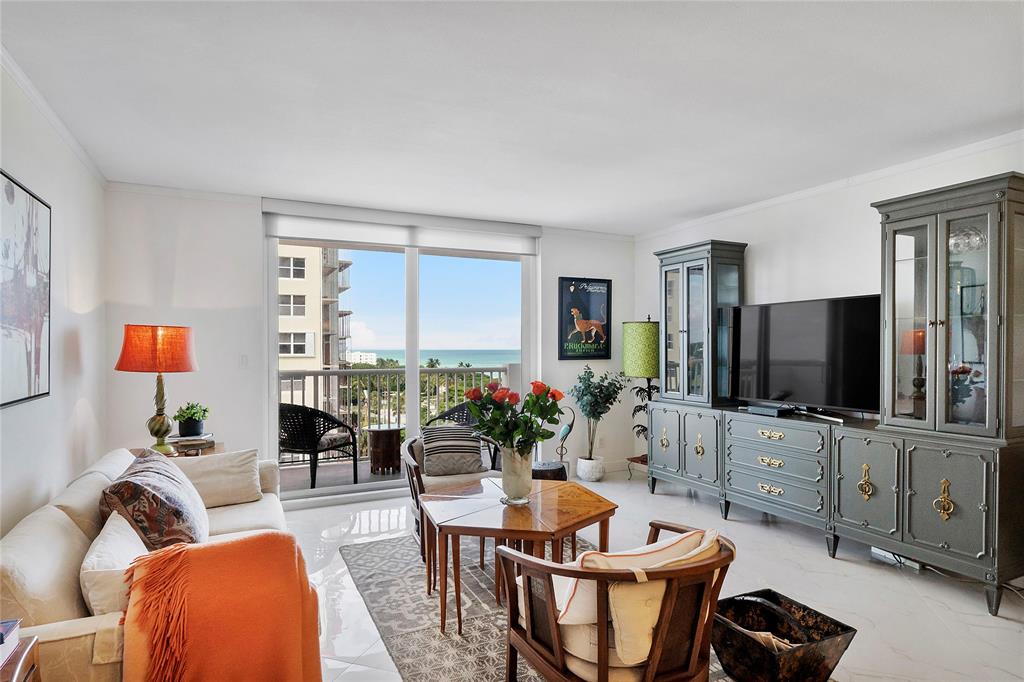 1601 South Ocean Drive, Unit 902 Hollywood, FL 33019 - Photo 14 of 40 a living room with furniture and a flat screen tv