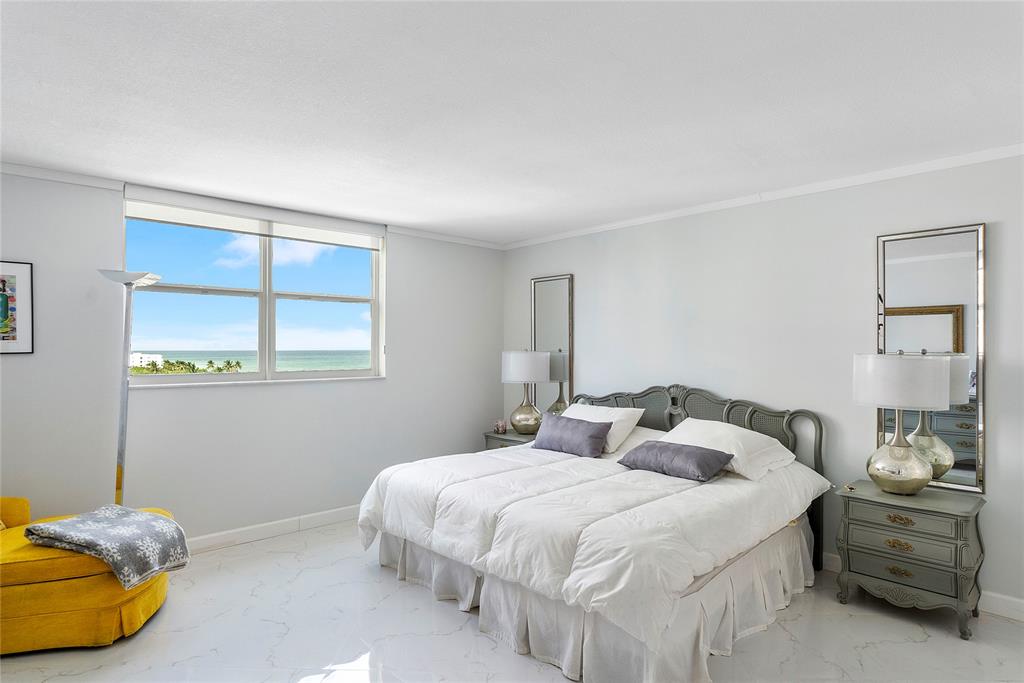 1601 South Ocean Drive, Unit 902 Hollywood, FL 33019 - Photo 18 of 40 a bedroom with a bed and window