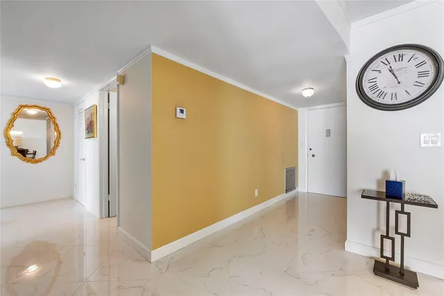 a view of a hallway with elevator