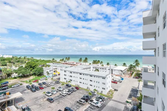 a view of a chairs and table in a backyard