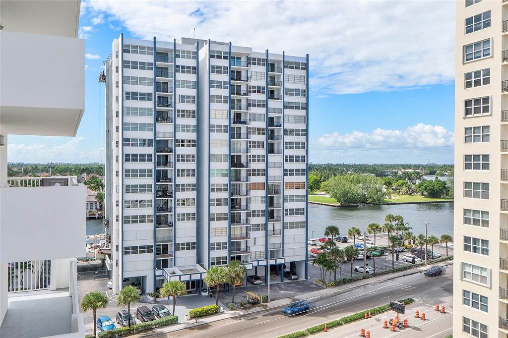 1601 South Ocean Drive, Unit 902 Hollywood, FL 33019 - Photo 34 of 40 a front view of a building with a yard