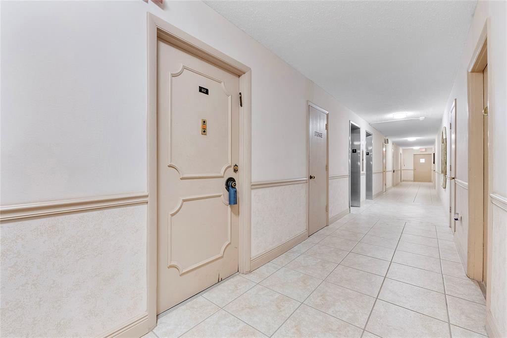 1601 South Ocean Drive, Unit 902 Hollywood, FL 33019 - Photo 35 of 40 a view of a hallway with a refrigerator