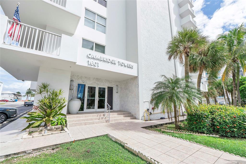 1601 South Ocean Drive, Unit 902 Hollywood, FL 33019 - Photo 37 of 40 a view of a house with a yard and potted plants