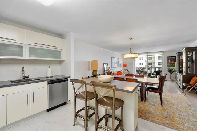 a view of a kitchen and dining room