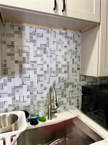 a bathroom with a sink and a bathtub