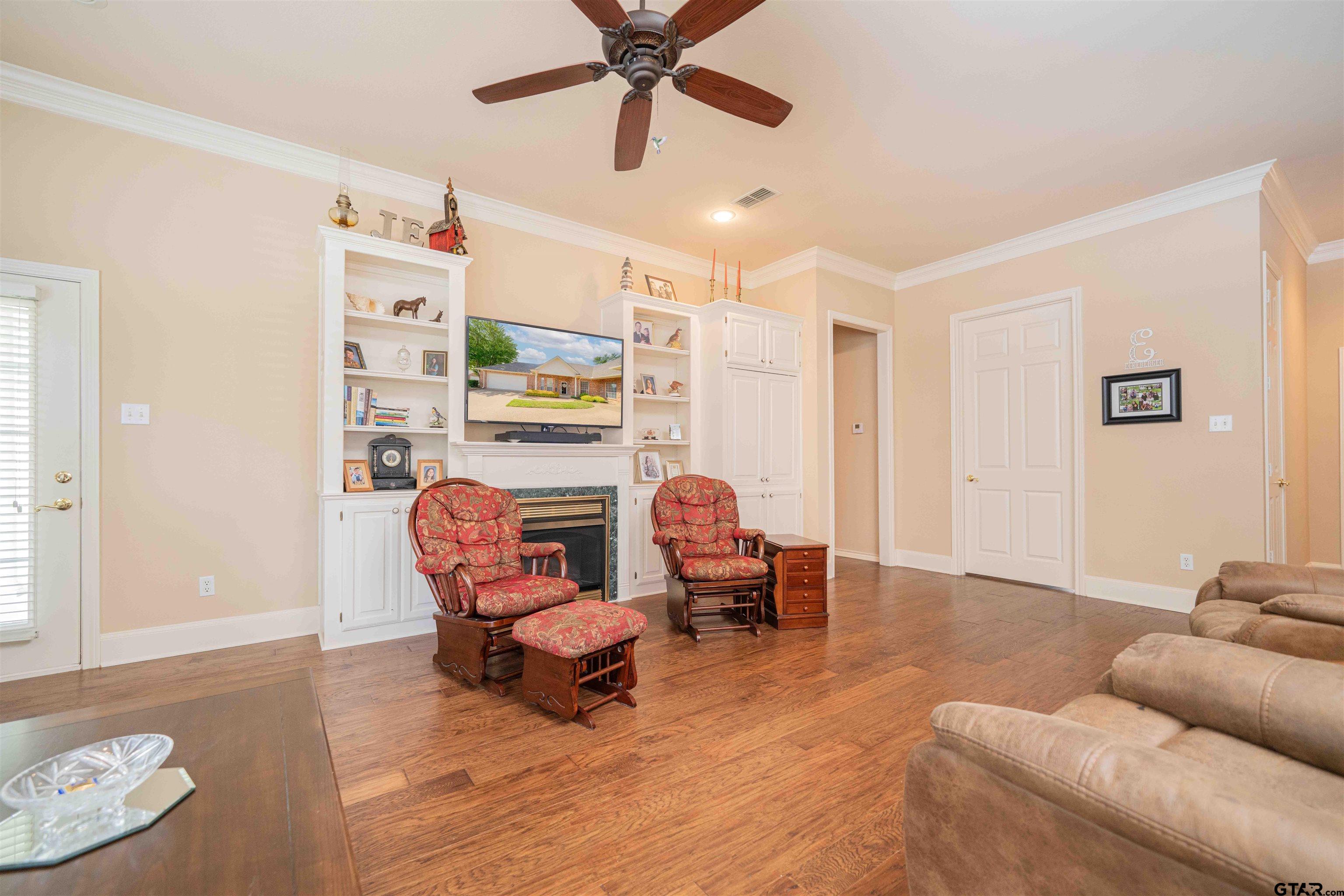 2215 Homestead Lane Tyler, TX 75701 - Photo 6 of 31 a living room with furniture and a window