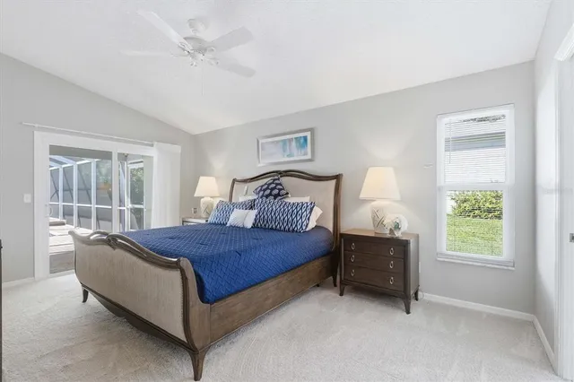 a bedroom with a bed and a dresser in it