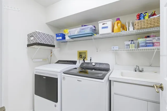 a kitchen with a stove and a refrigerator