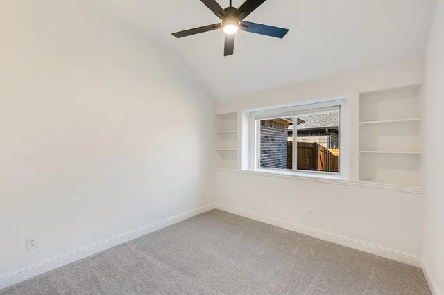 a living room with furniture and window