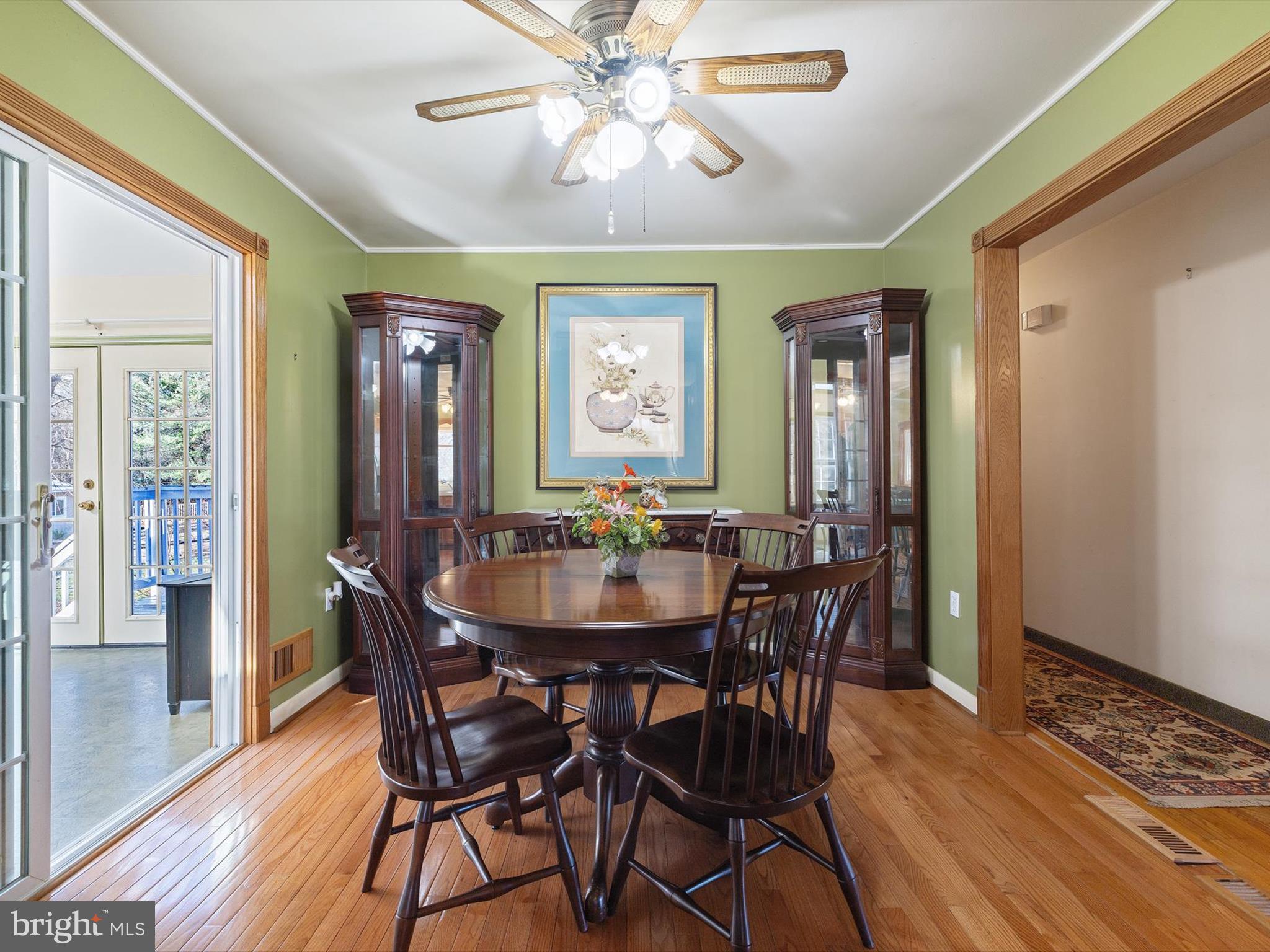 1345 Ava Road Severn, MD 21144 - Photo 11 of 41 a view of a a dining room with furniture window and wooden floor