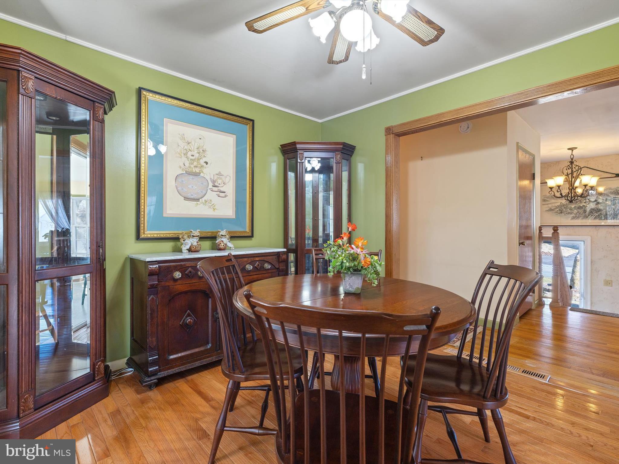 1345 Ava Road Severn, MD 21144 - Photo 12 of 41 a view of a dining room with furniture and chandelier
