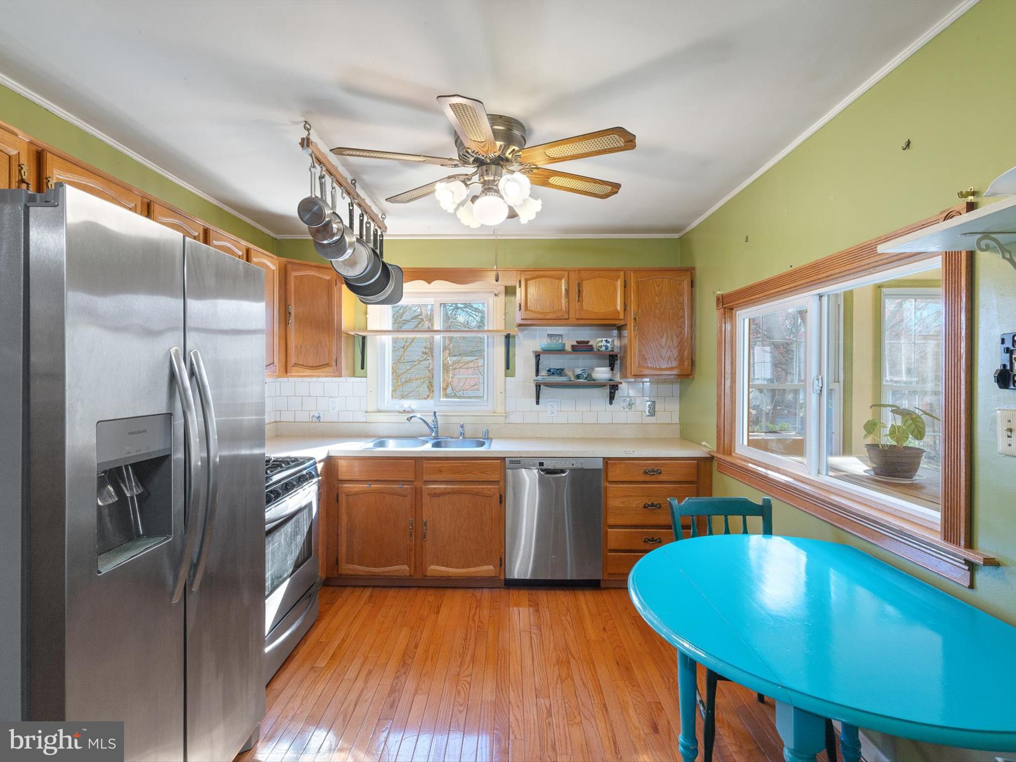 1345 Ava Road Severn, MD 21144 - Photo 14 of 41 a kitchen with stainless steel appliances granite countertop a sink a stove and refrigerator