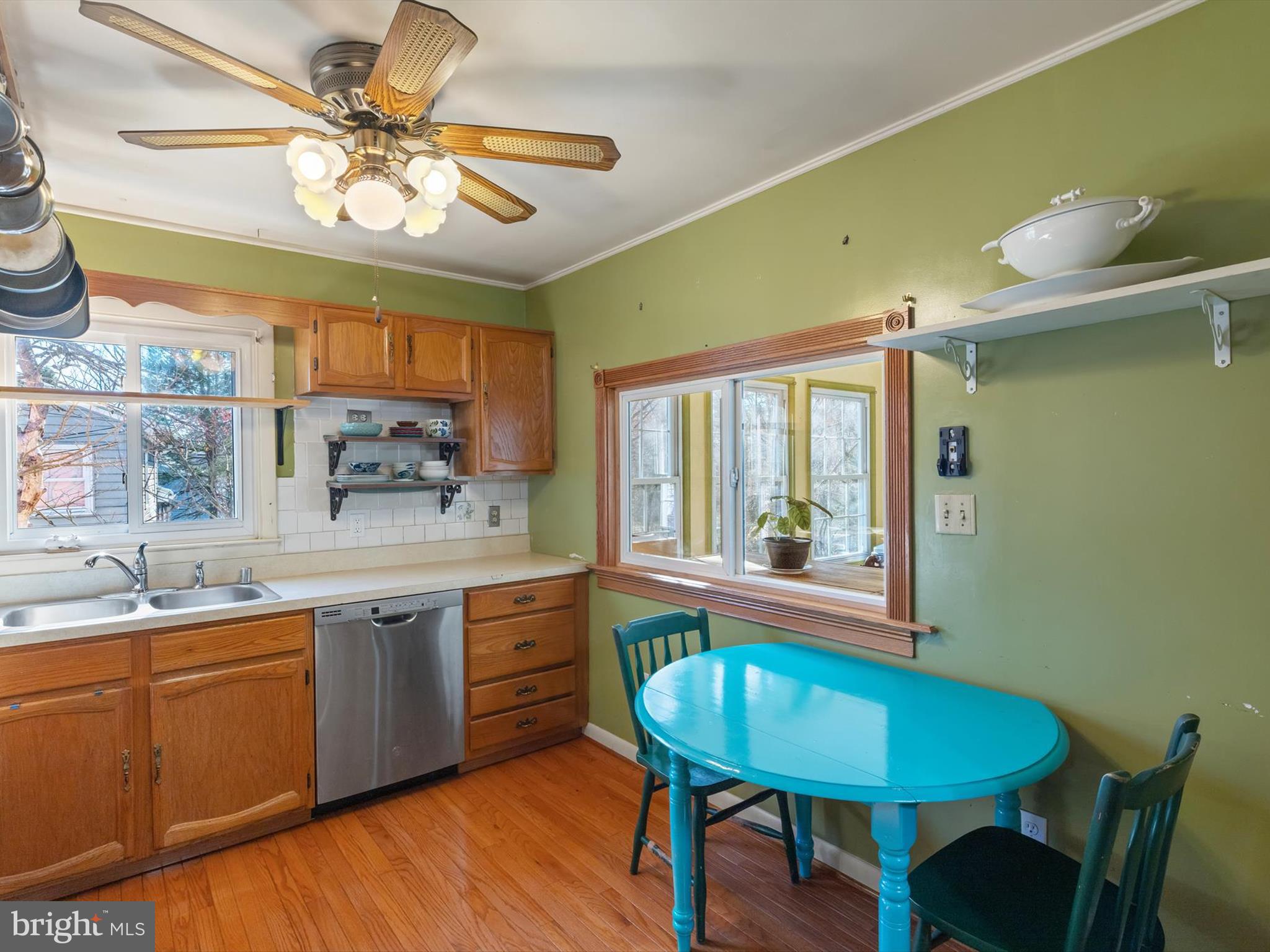 1345 Ava Road Severn, MD 21144 - Photo 15 of 41 a view of a dining room with furniture window and wooden floor