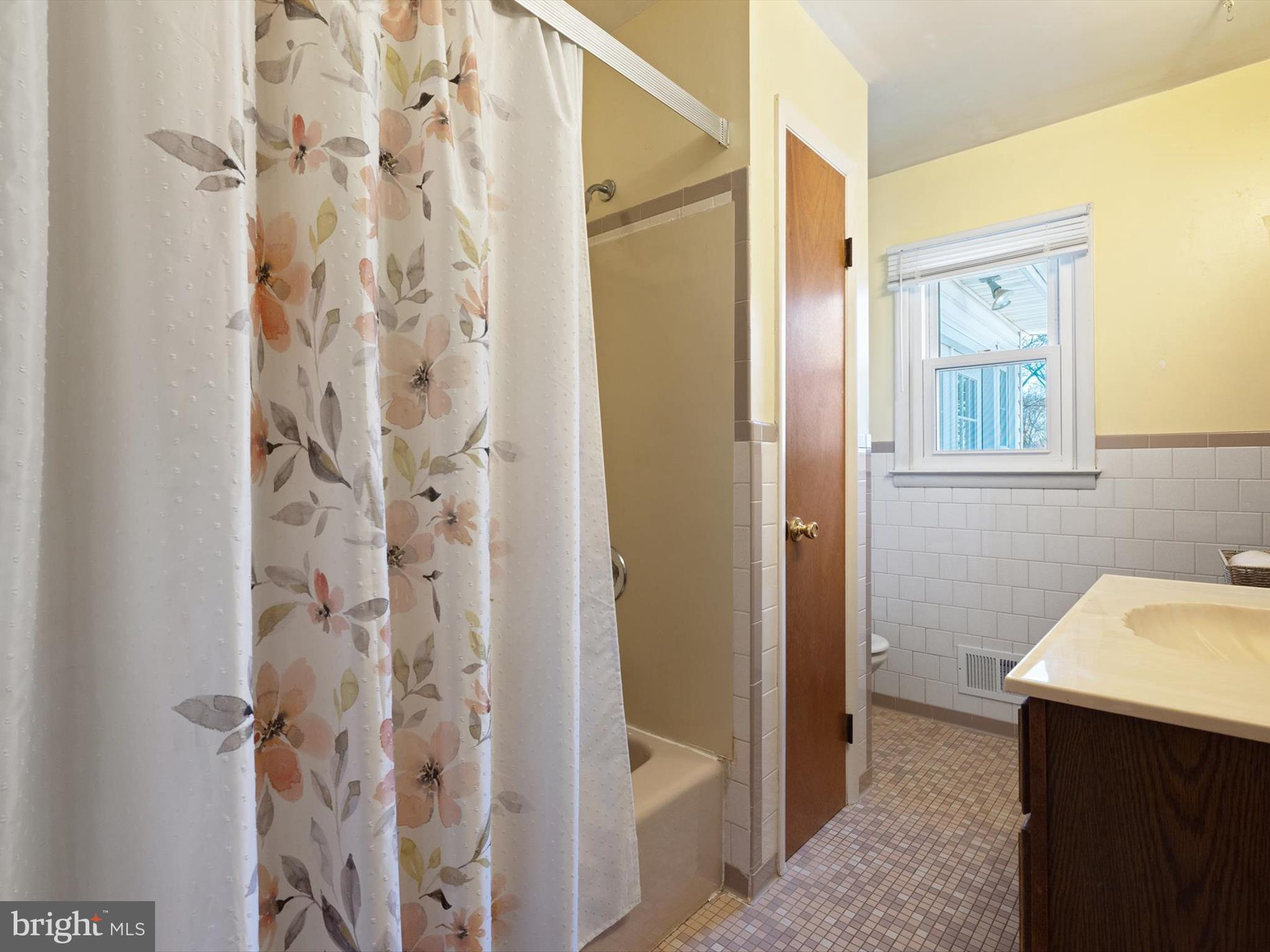 1345 Ava Road Severn, MD 21144 - Photo 22 of 41 a bathroom with a sink and shower