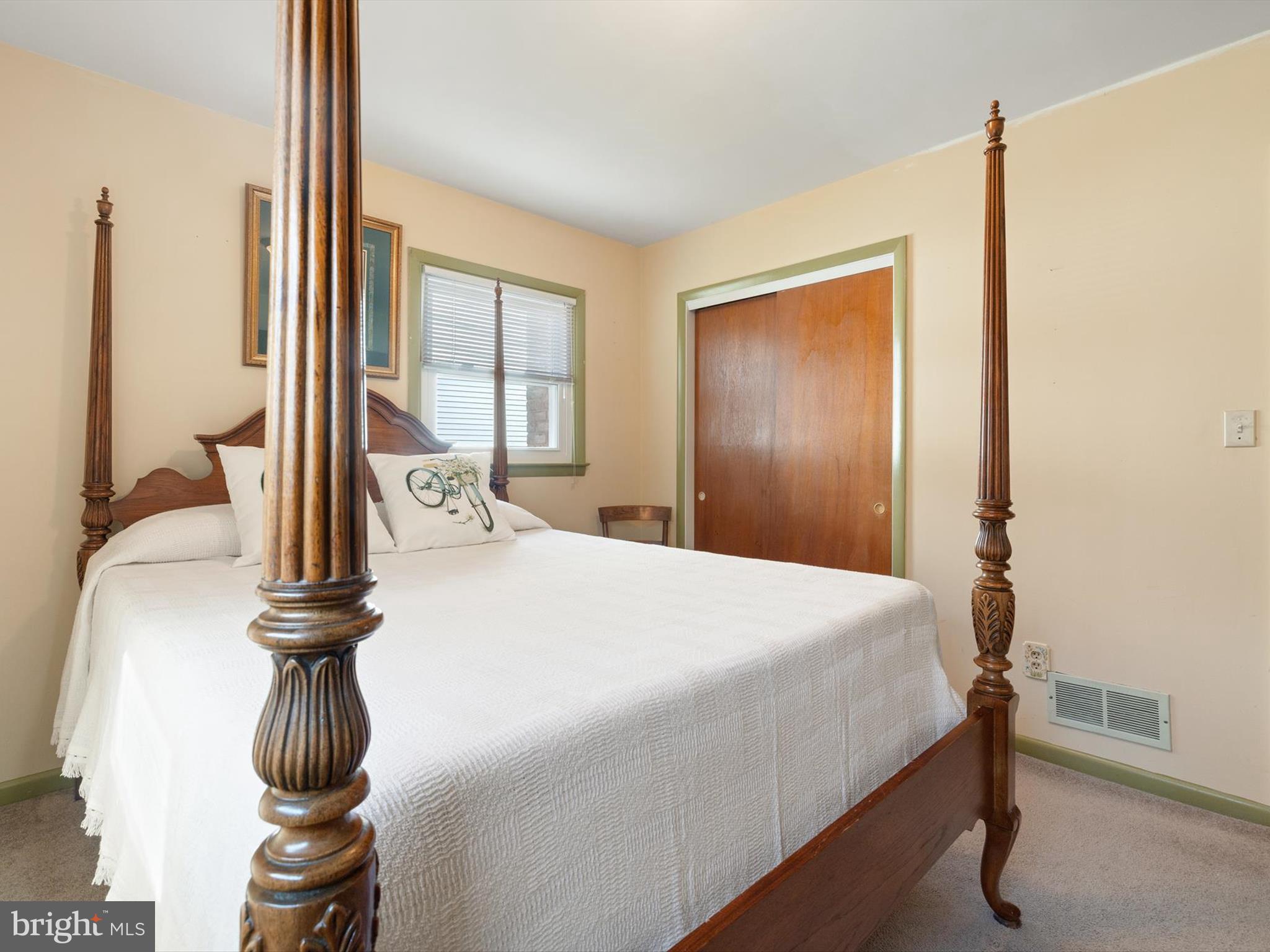 1345 Ava Road Severn, MD 21144 - Photo 24 of 41 a bedroom with a bed and large windows