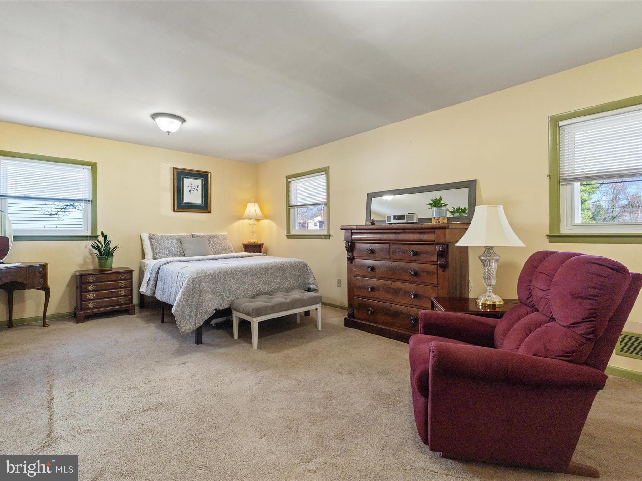 1345 Ava Road Severn, MD 21144 - Photo 26 of 41 a bedroom with furniture and a dresser
