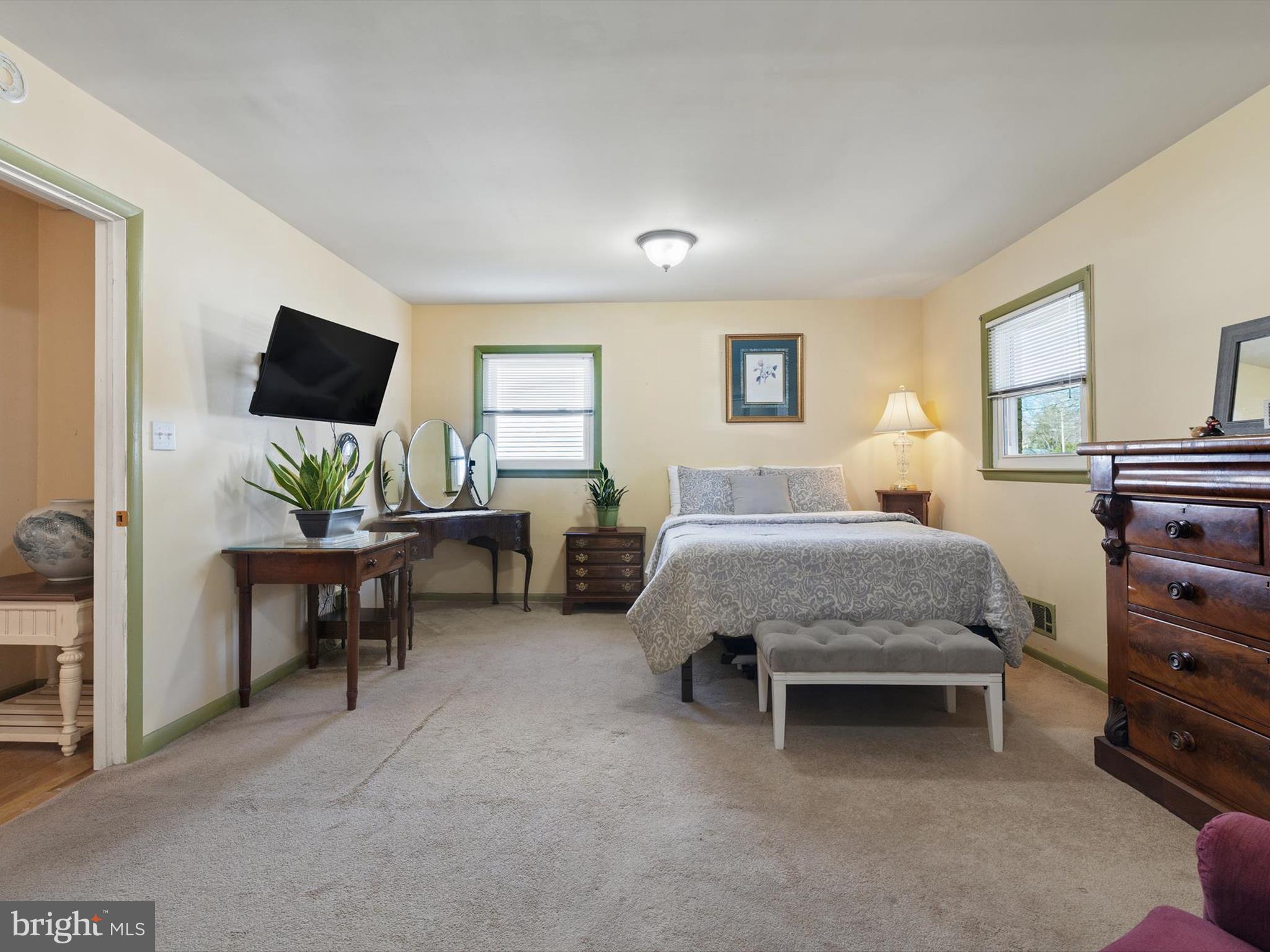 1345 Ava Road Severn, MD 21144 - Photo 27 of 41 a bedroom with a bed and a flat screen tv