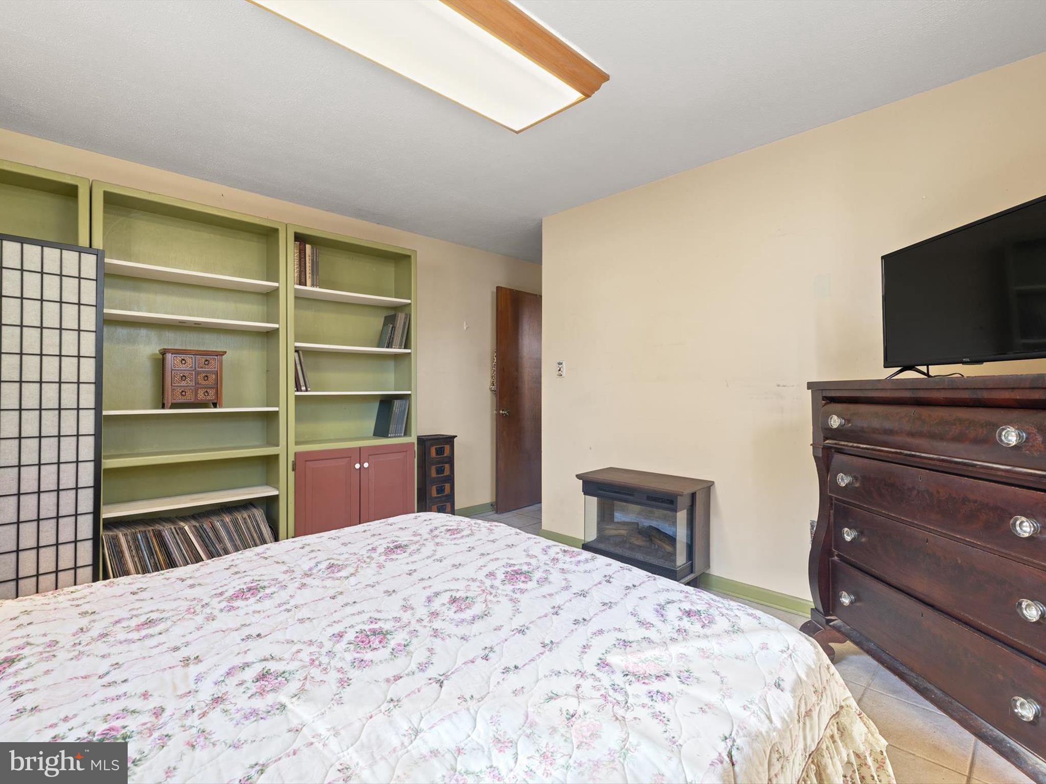 1345 Ava Road Severn, MD 21144 - Photo 33 of 41 a bedroom with a bed and a television