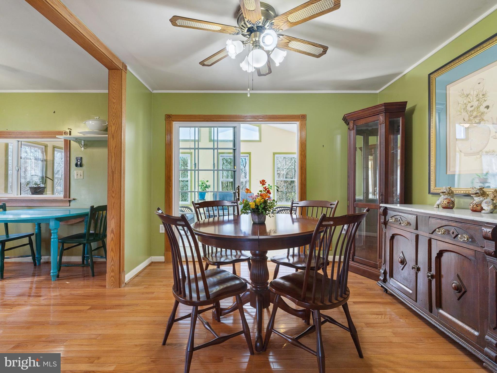 1345 Ava Road Severn, MD 21144 - Photo 9 of 41 a view of a dining room with furniture window and wooden floor