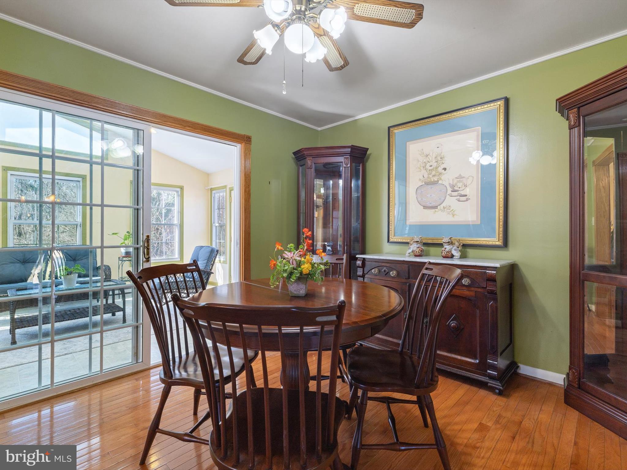 1345 Ava Road Severn, MD 21144 - Photo 10 of 41 a view of a dining room with furniture window and wooden floor