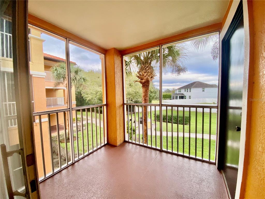 5459 Vineland Road, Unit 4210 Orlando, FL 32811 - Photo 14 of 25 a view of a large window with an outdoor space