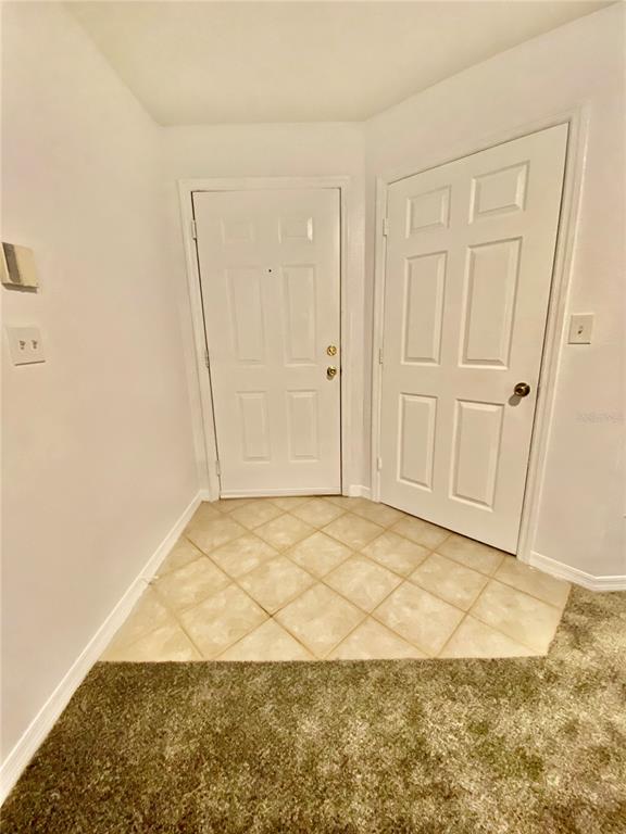 5459 Vineland Road, Unit 4210 Orlando, FL 32811 - Photo 10 of 25 a view of wooden door