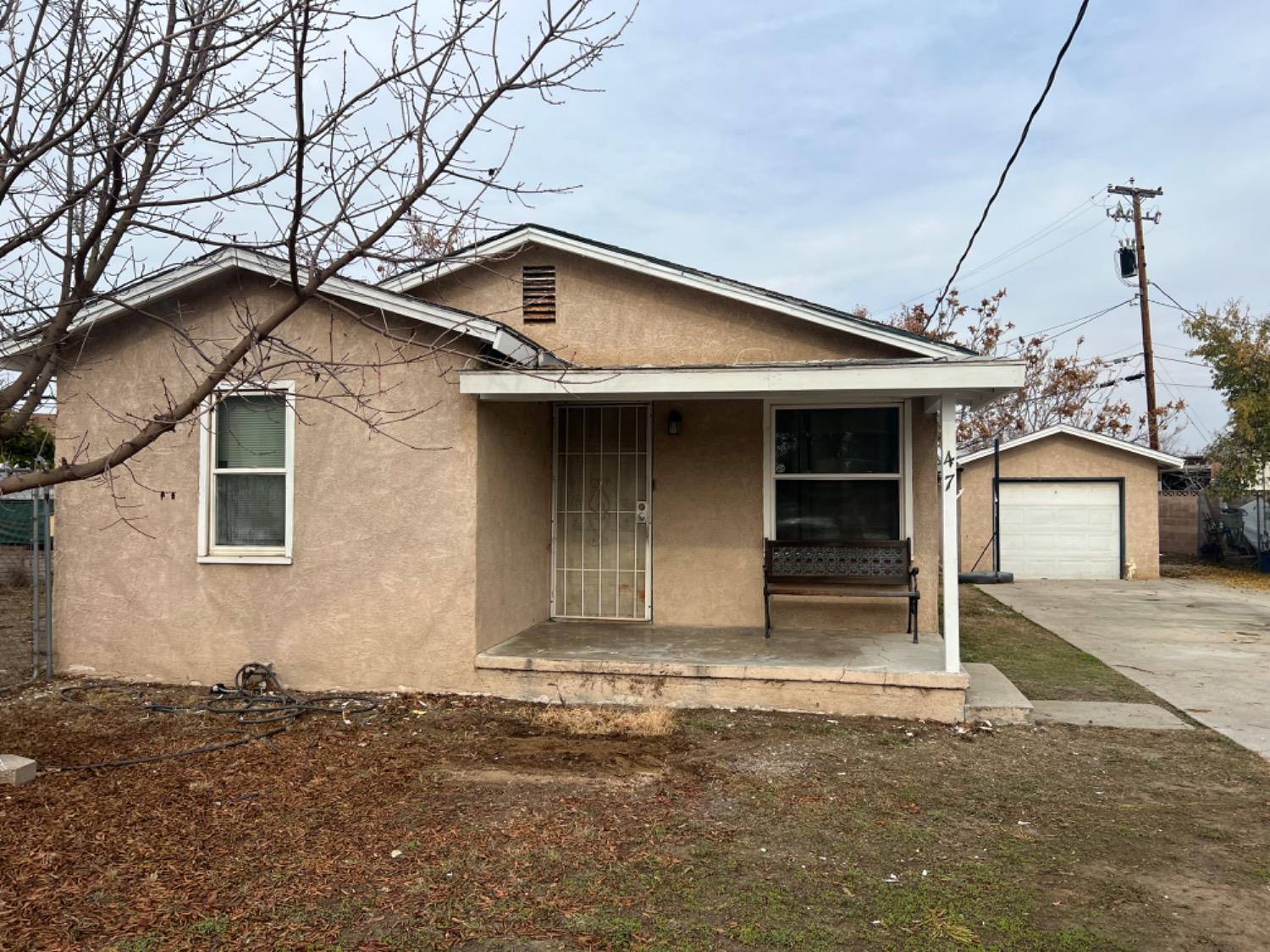 a house that has a window in front of it
