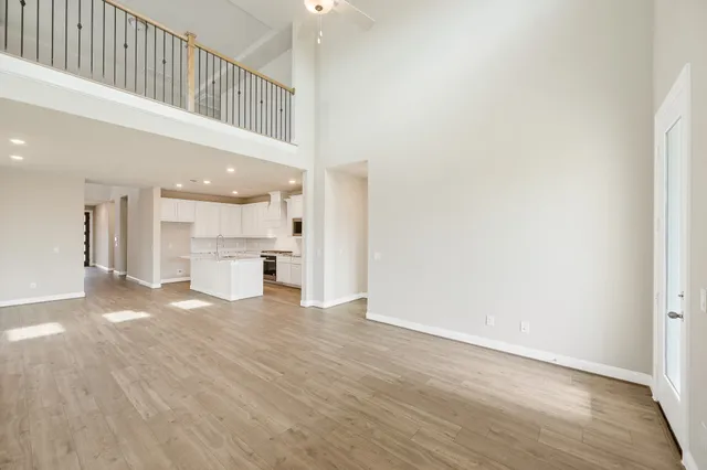 a view of a kitchen with a sink and a window