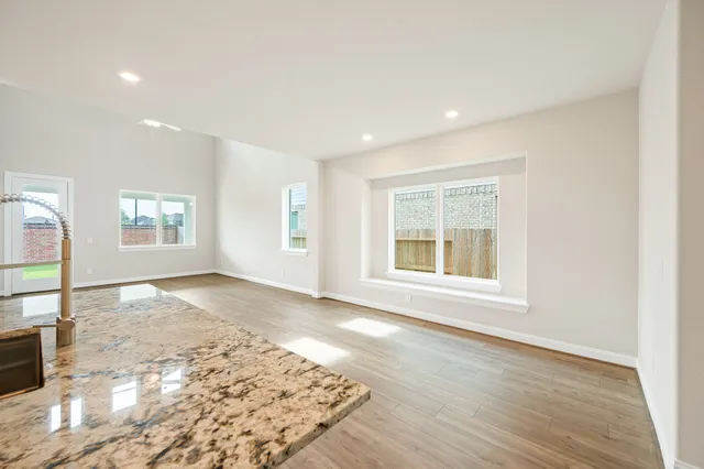 an empty room with windows