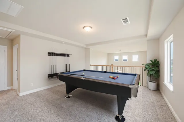 a room with furniture and window