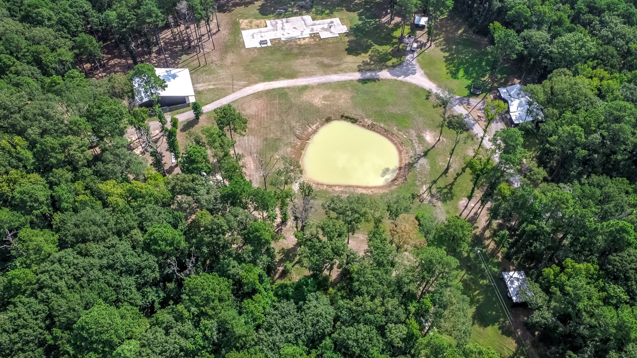 60x40 Shop (Upper Left), 4250 SF Foundation (Top), Well House (Upper Rt), 1800 SF House (Rt), Lean too (Bottom Rt)