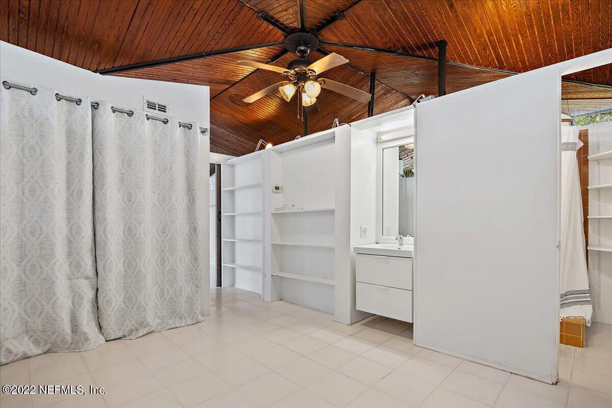 1613 Ocean Boulevard Atlantic Beach, FL 32233 - Photo 6 of 9 a view of walk in closet with white walls