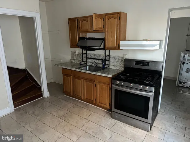 a view of a livingroom with wooden floor