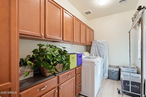 a utility room with washer and dryer