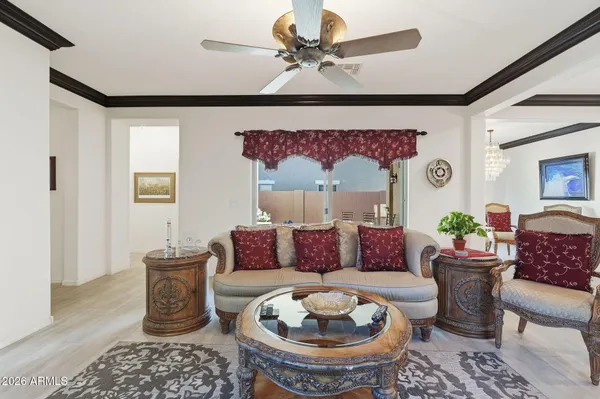 a living room with furniture and a rug