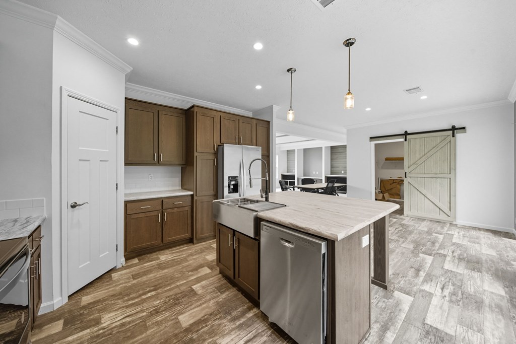 155 Linda Lane Murphy, NC 28906 - Photo 10 of 12 a kitchen with kitchen island a sink stainless steel appliances and cabinets