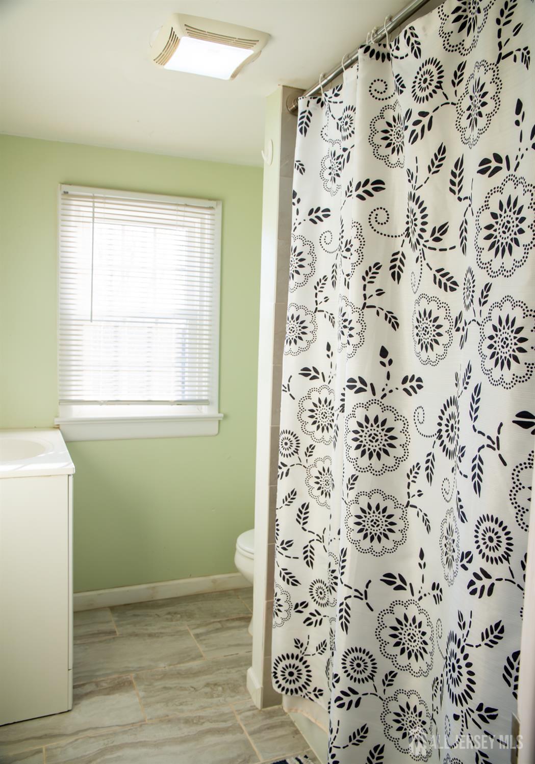 13 Eberly Place Fords, NJ 08863 - Photo 11 of 12 a view of a room with window and hardwood