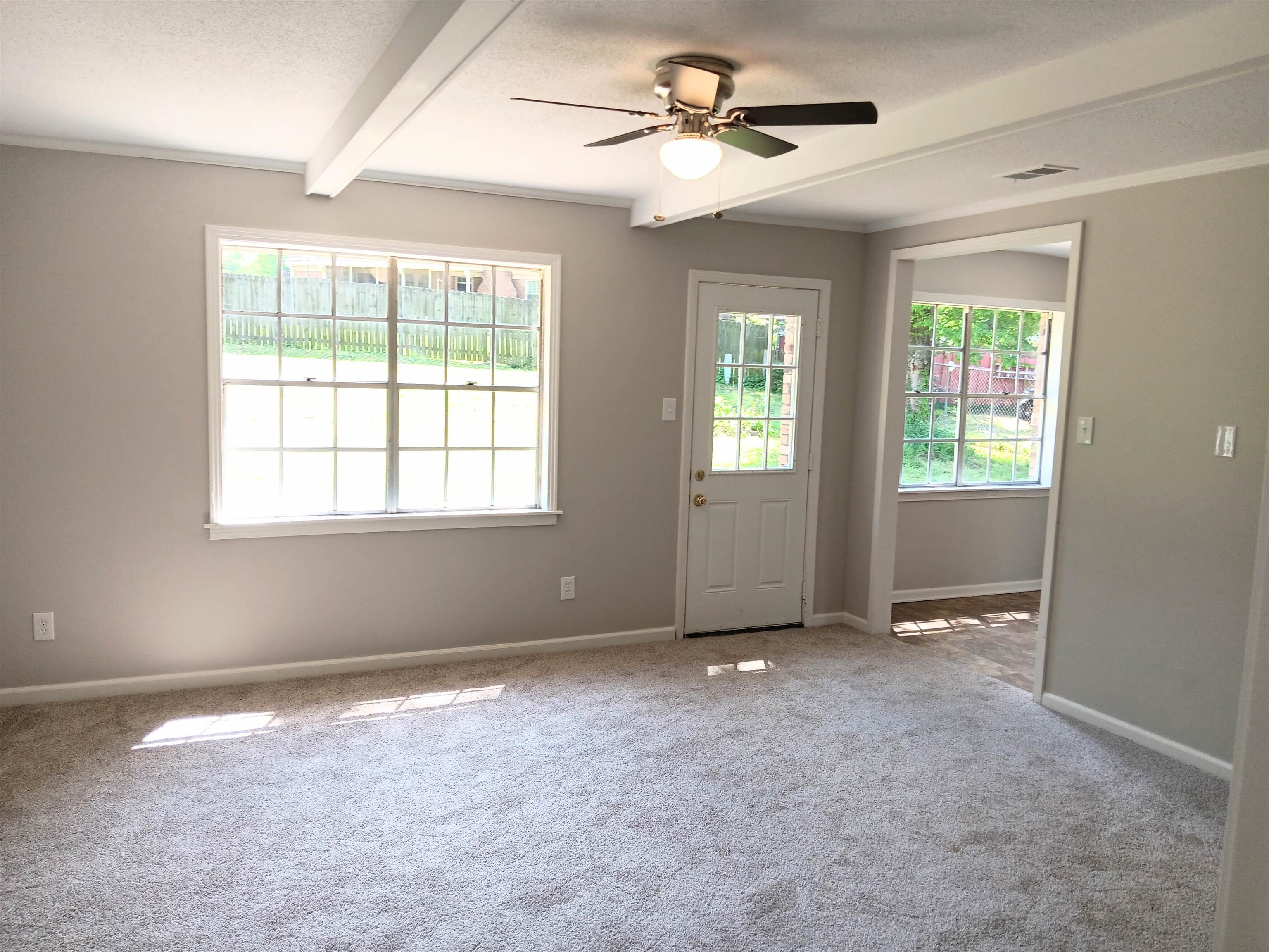 6085 Ivanhoe Road Bartlett, TN 38134 - Photo 4 of 20 a view of an empty room with a window