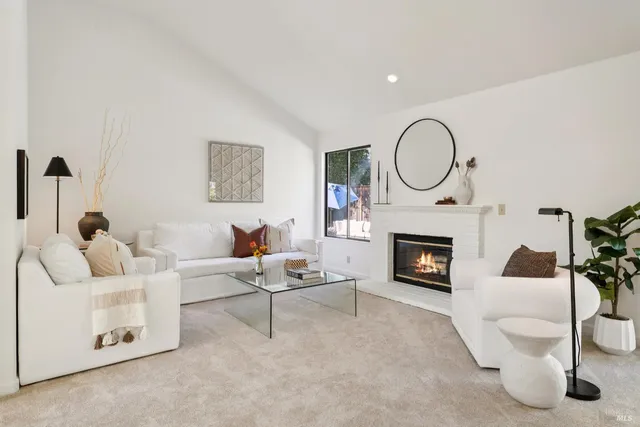 a bed room with a bed and a large window