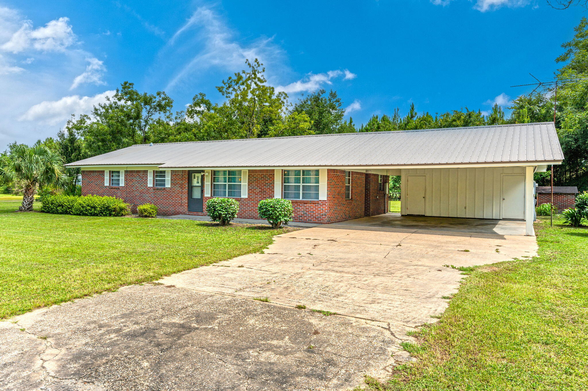 367 Andy Nowling Road DeFuniak Springs, FL 32433 - Photo 2 of 36 a view of house with outdoor space and garden