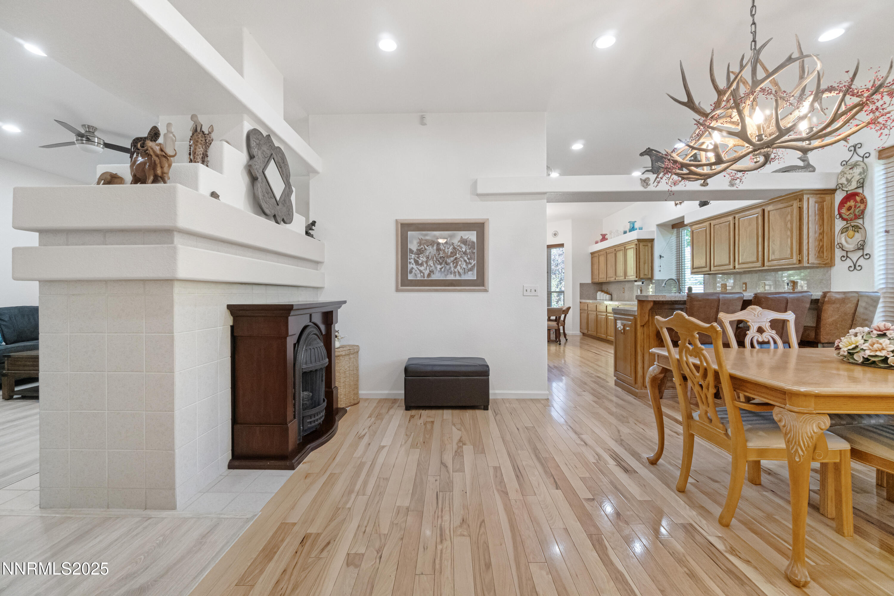 1216 Pleasantview Drive Gardnerville, NV 89460 - Photo 15 of 32 a view of a dining room with furniture and wooden floor