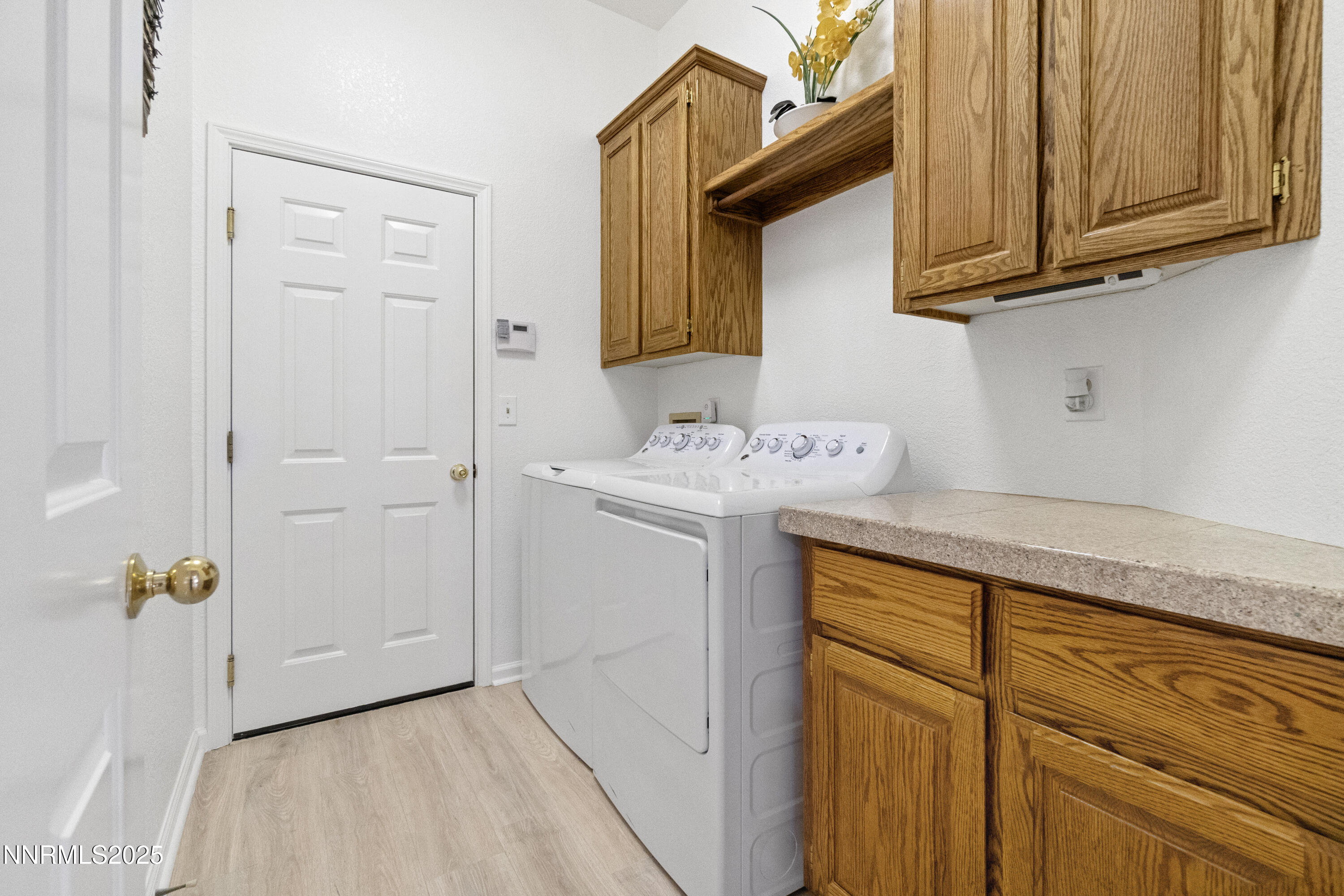 1216 Pleasantview Drive Gardnerville, NV 89460 - Photo 26 of 32 a utility room with a sink