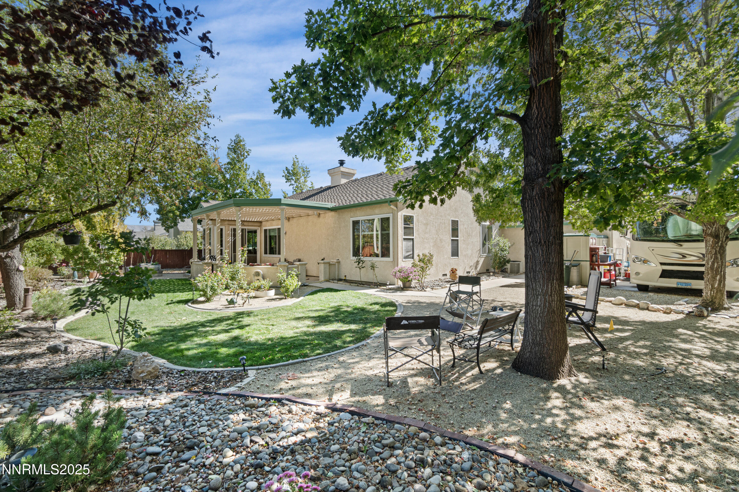 1216 Pleasantview Drive Gardnerville, NV 89460 - Photo 29 of 32 a front view of a house with garden and patio