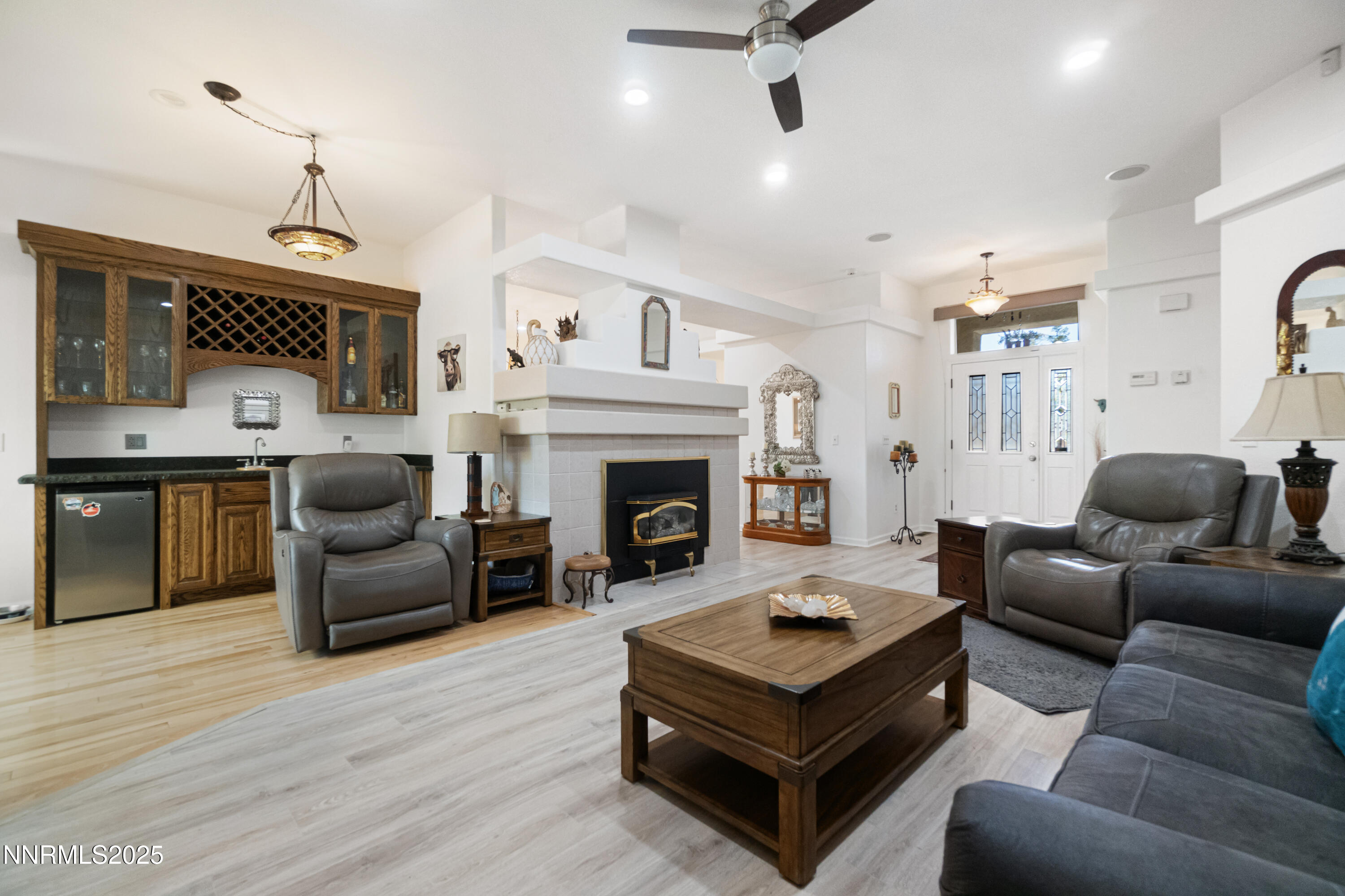 1216 Pleasantview Drive Gardnerville, NV 89460 - Photo 6 of 32 a living room with furniture and a fireplace