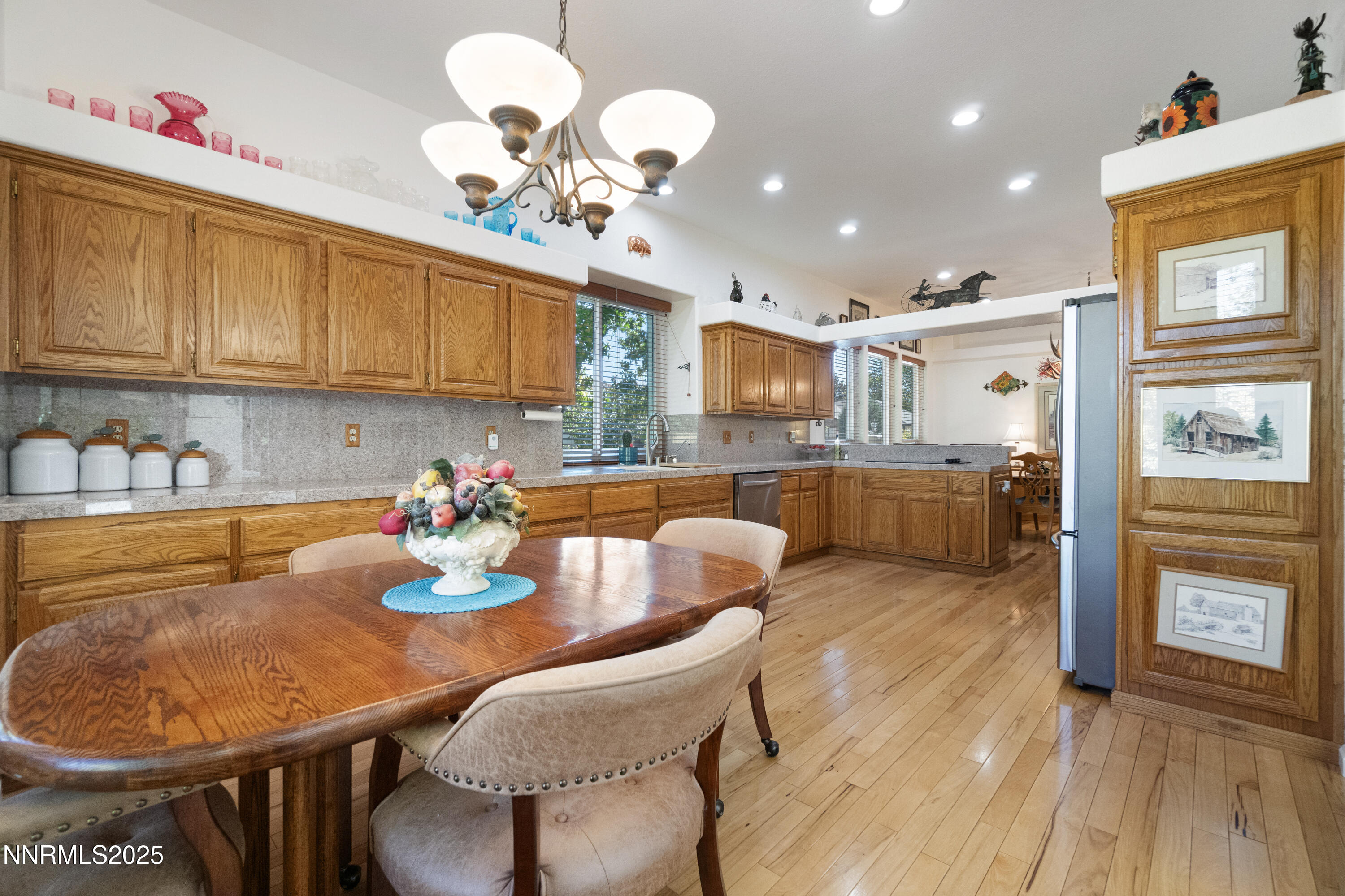 1216 Pleasantview Drive Gardnerville, NV 89460 - Photo 10 of 32 a kitchen with a table and chairs in it