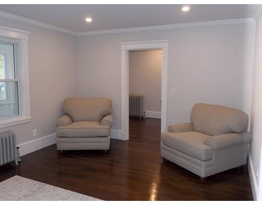 10 Fulton Street Woburn, MA 01801 - Photo 12 of 34 a living room with furniture and a wooden floor